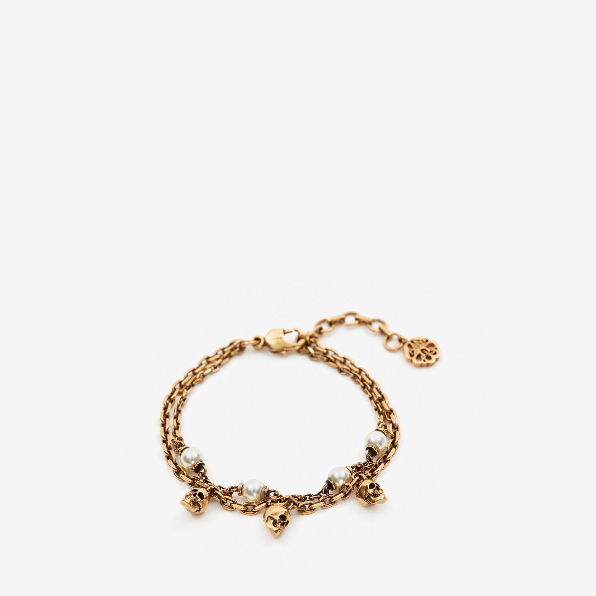 Shop Alexander Mcqueen Pearl Skull Chain Bracelet In Antique Gold
